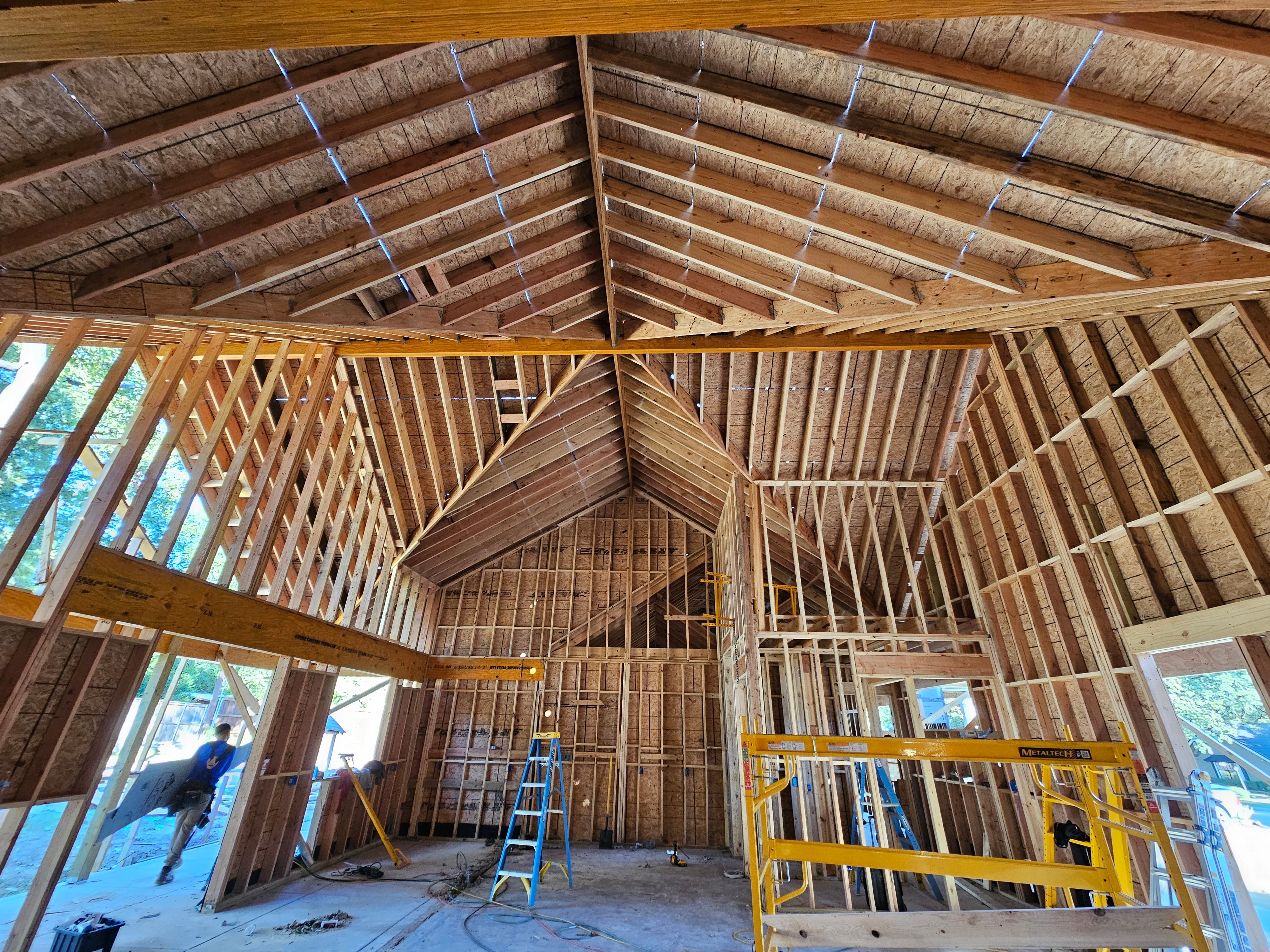 Long-span roof framing with engineered members set — Nova Luxe Construction, Dallas–Fort Worth