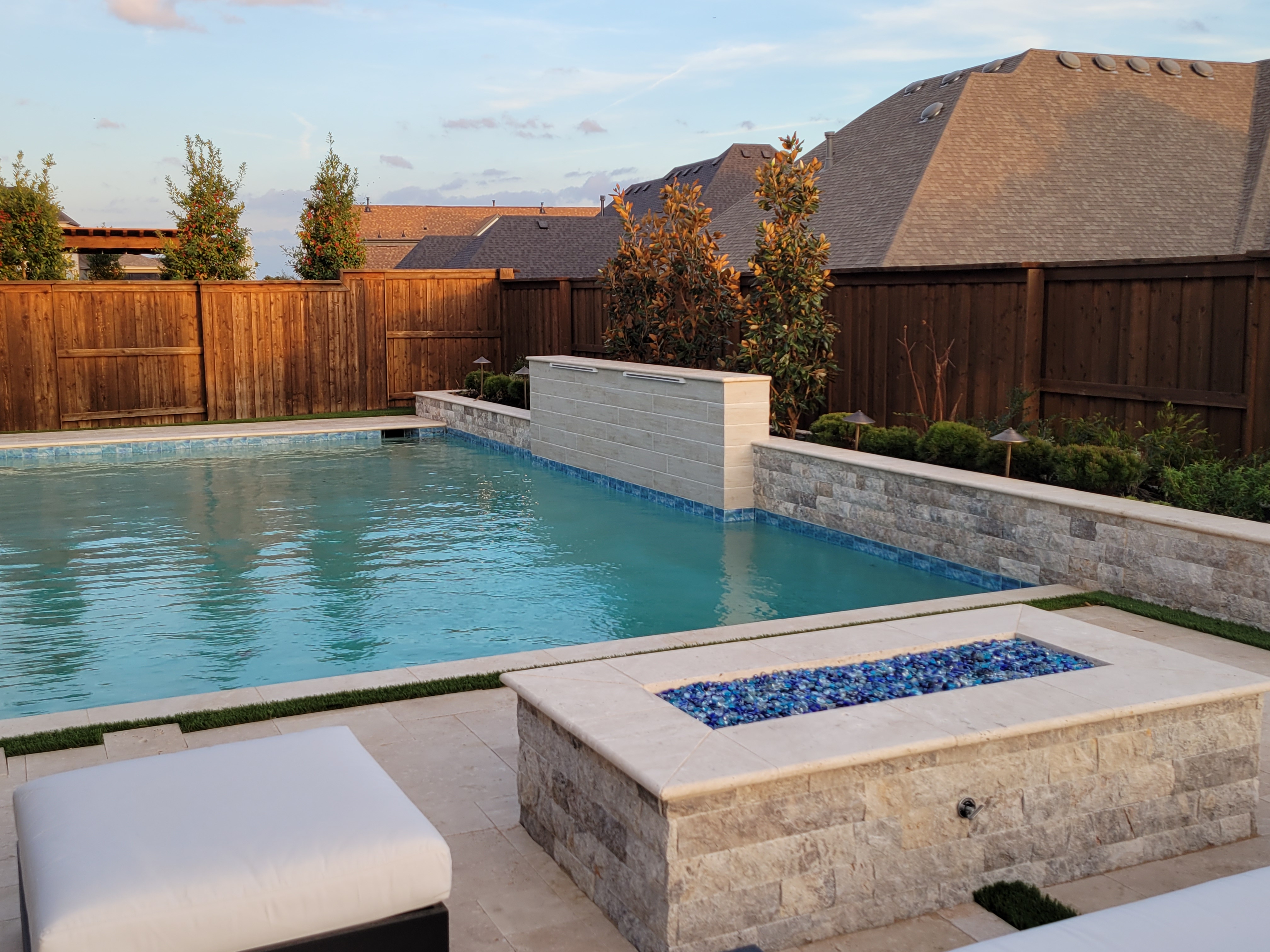 Completed pool environment and covered outdoor living in Colleyville, Texas — Nova Luxe Construction
